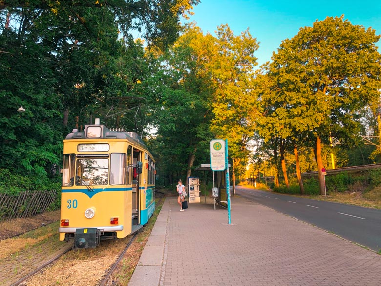 a yellow, historical tram at Woltersdorf Tramway line 87 to get from Berlin Rahnsdorf S-bahn station to Schleuse Woltersdorf
