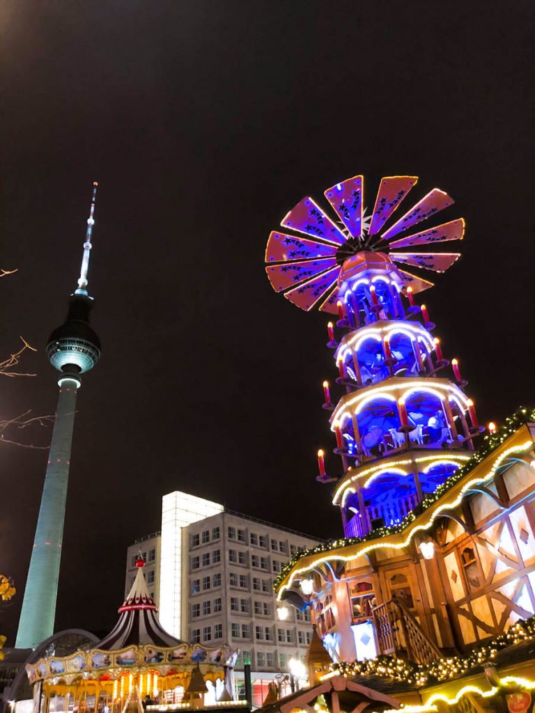 traditional german christmas market at alexanderplatz berlin with fernsehturm tv tower in the background