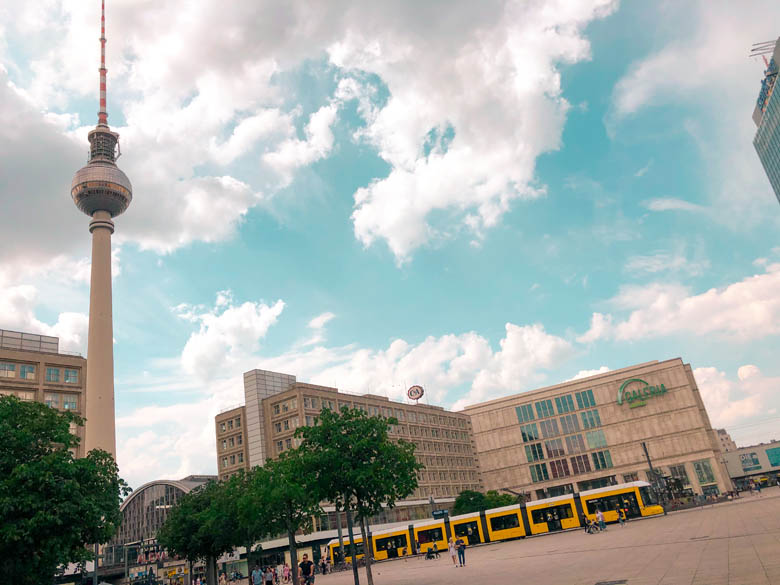 visiting alexanderplatz in berlin during coronavirus - empty square that would usually be full of tourists during summer in europe