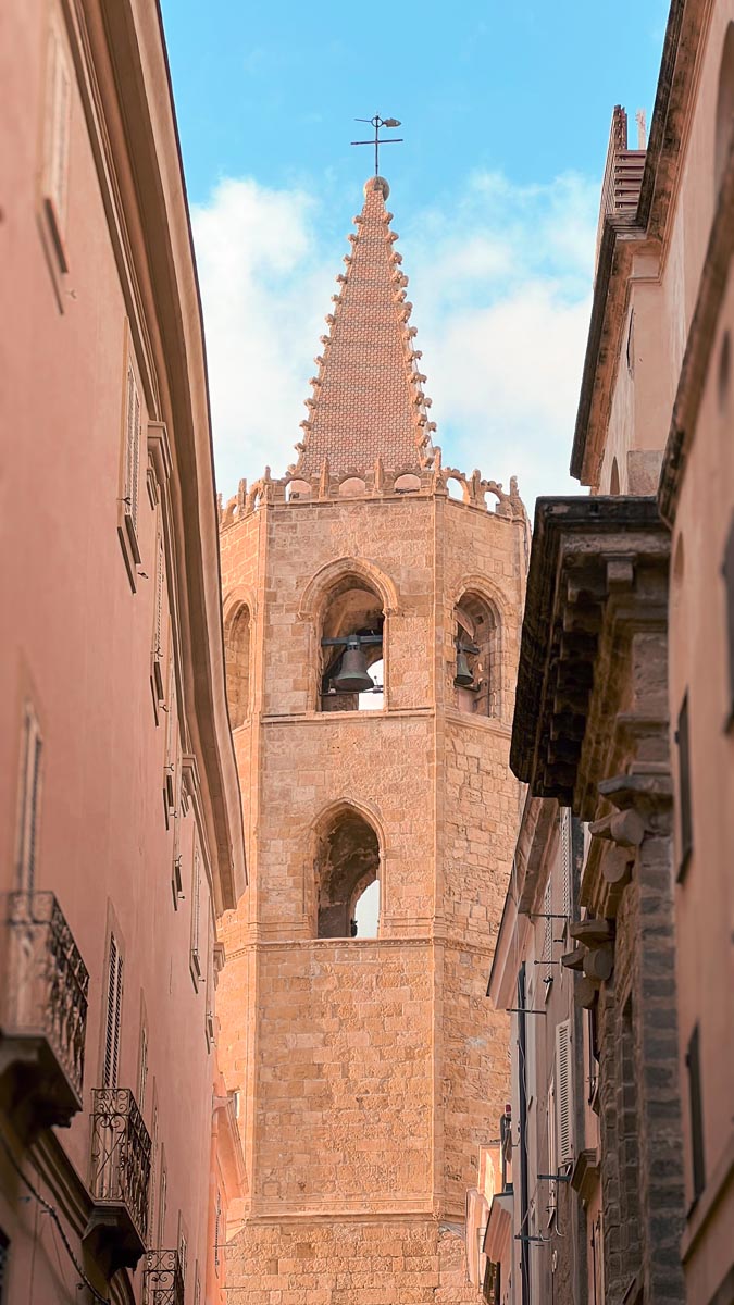 steepled roof of a church in old town alghero in north west sardinia
