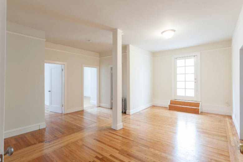 empty apartment with wooden floors and white walls in germany and how to rent 