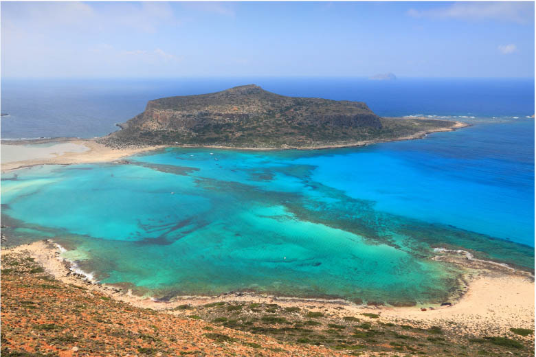 view from the top of balos lagoon - one of the most famous beaches in crete greece