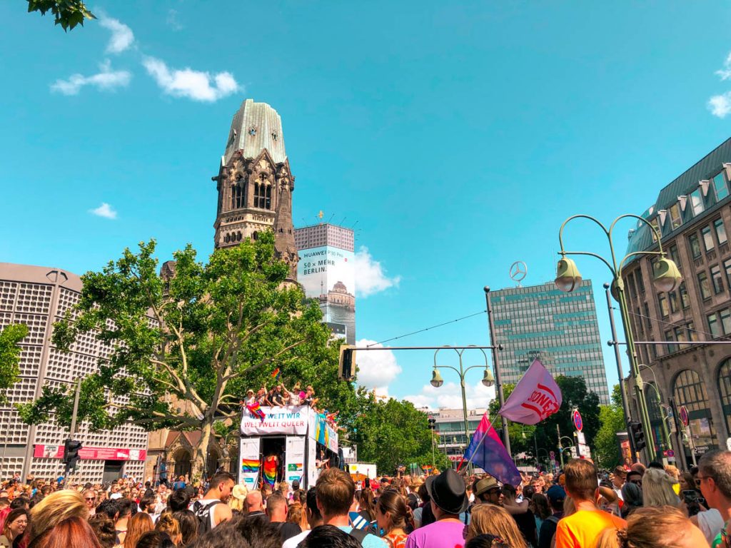 crowds of people attending christopher street day or berlin pride at kurfürstendamm