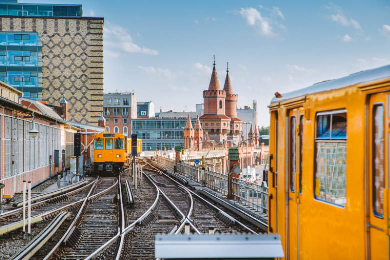 yellow bvg trains with oberbaum bridge in the background is a nice day trip from berlin to potsdam