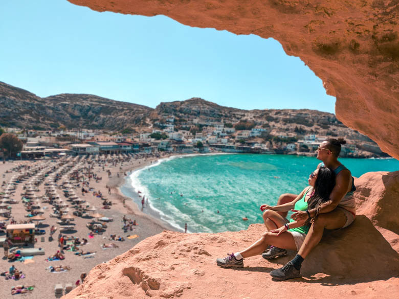 instagram photography of a couple at matala beach in greece