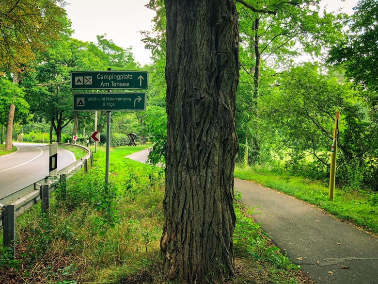 The cycling route and road leading to the camping sites at Tonsee lake near Berlin