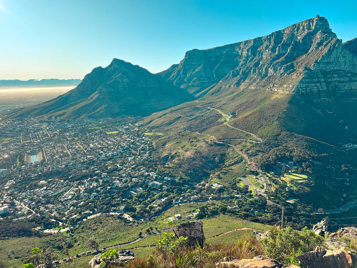 a viewpoint of table mountain with its iconic flat top and the city sprawled below