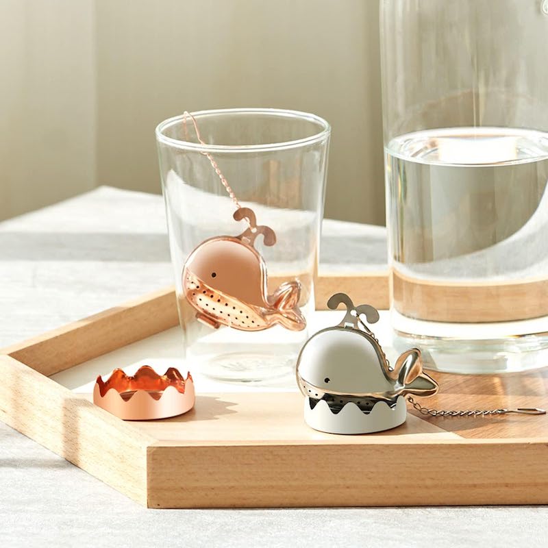 stainless steel whale shaped tea infusers set in a drinking glass
