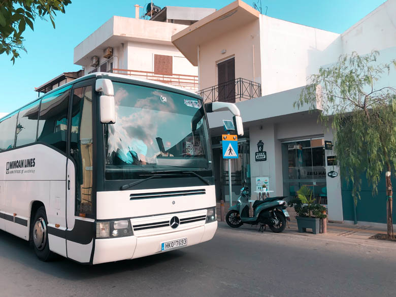 a white public bus in crete 