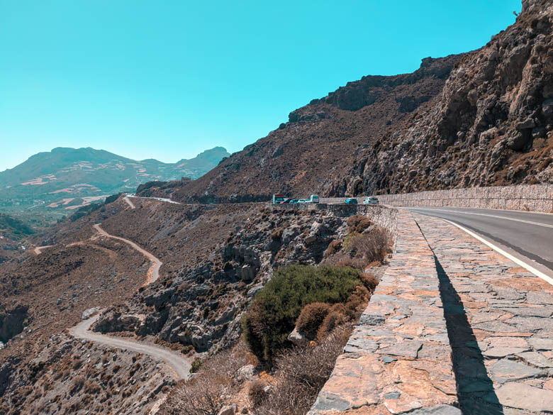 a mountainous road in crete with views down the valley