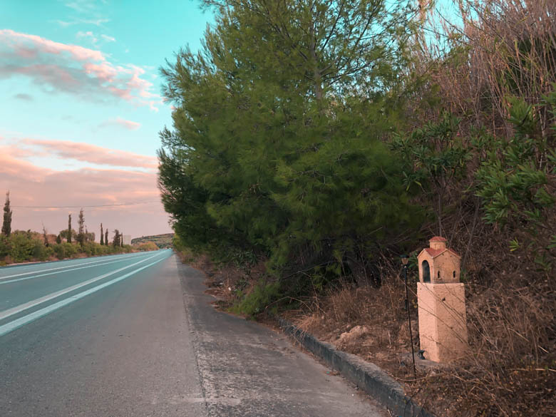 a mini church or chapel shrine on the side of the road in crete greece