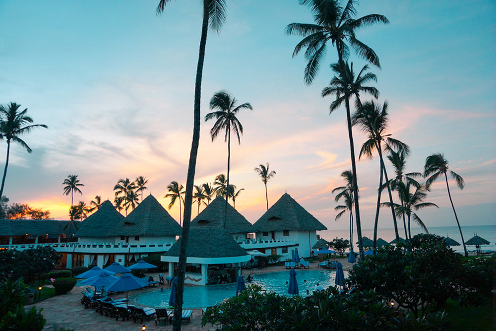 doubletree by hilton hotel in zanzibar nungwi is an all inclusive resort on the beach at sunset