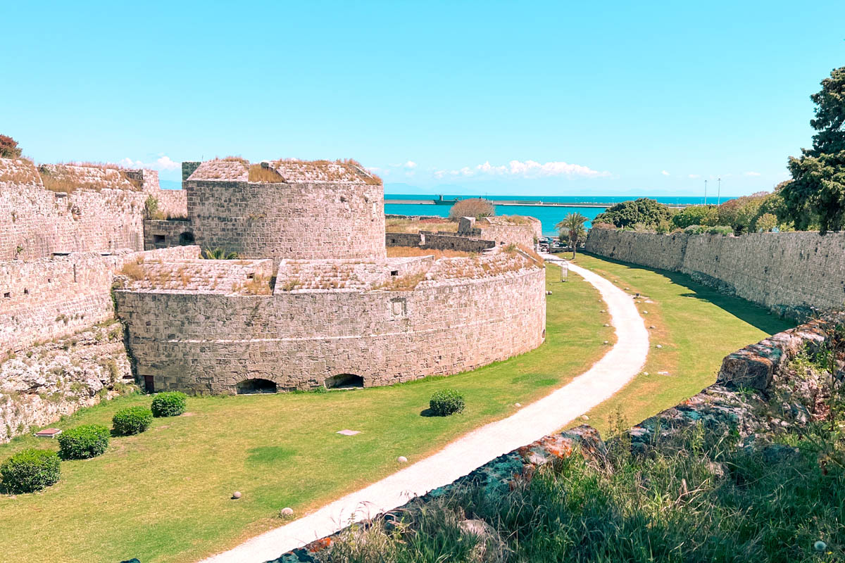 the medieval trench trail surrounding the fort walls of old town rhodes in greece