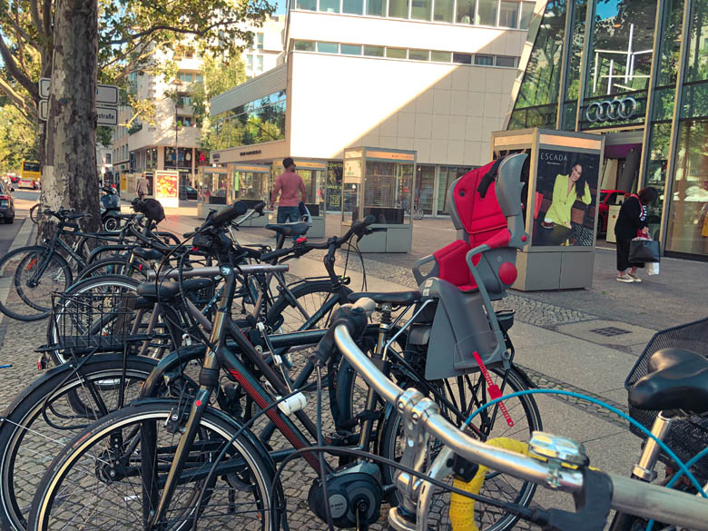 a child seat installed on one of the bikes parked in germany