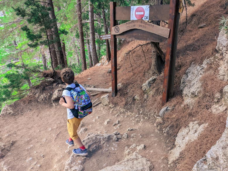 a kid hiking in crete