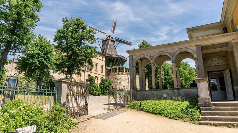 historic mill of sanssouci is a traditional dutch windmill used to grind corn next to sanssouci palace