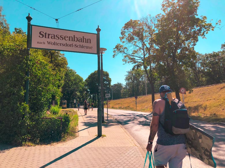 a man walking towards the Woltersdorf Strassenbahn to get to Flakensee from Berlin Rahndorf train station