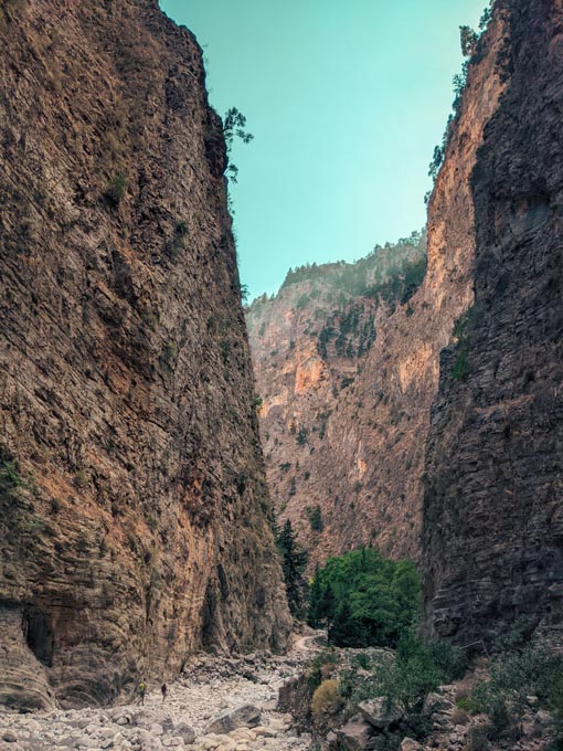 tall cliffs on both sides of a hiking route in crete greece