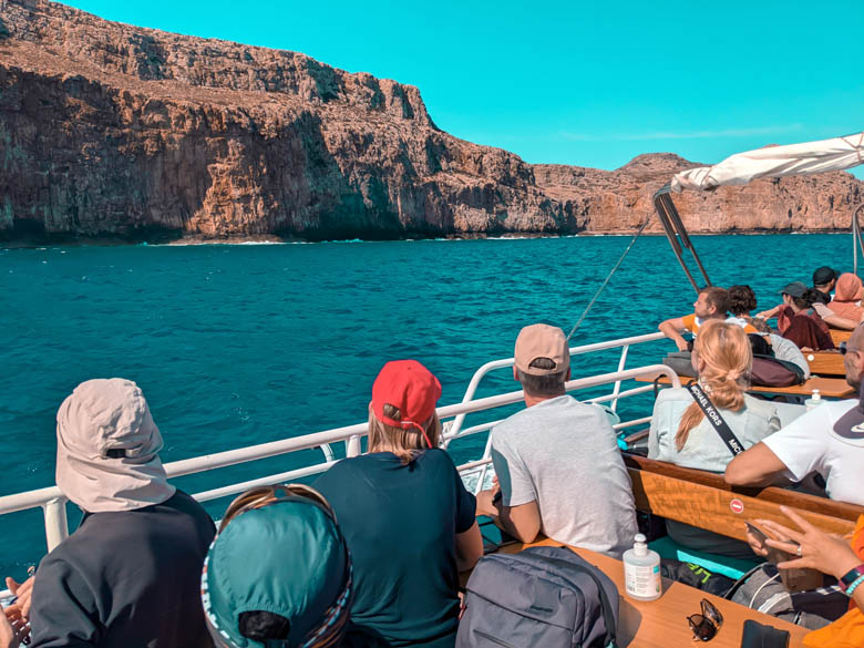 tourists taking a ferry to balos and gramvousa island in crete