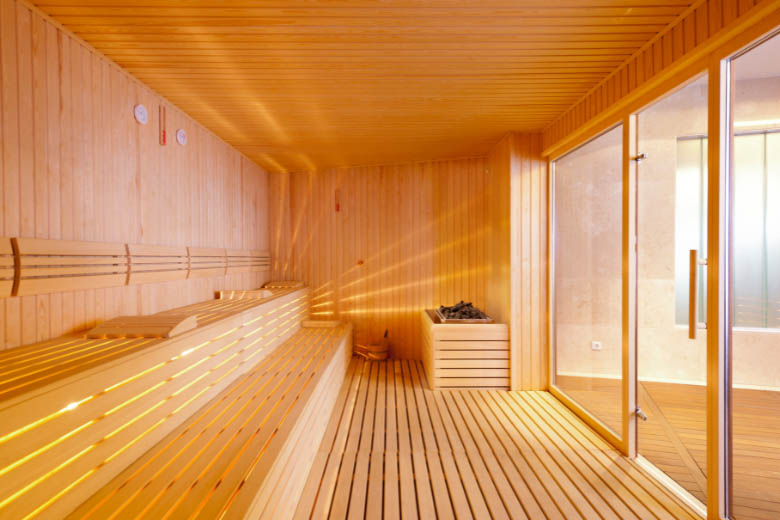 a typical finnish sauna in germany with warm wooden cladding