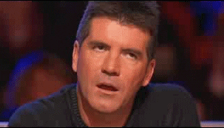 GIF of Simon Cowell trying to understand how to travel for cheap