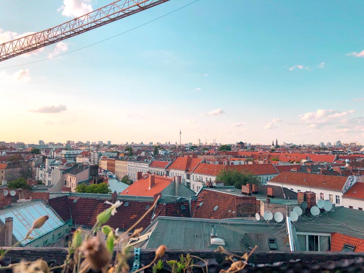 a view of the city of berlin from a rooftop