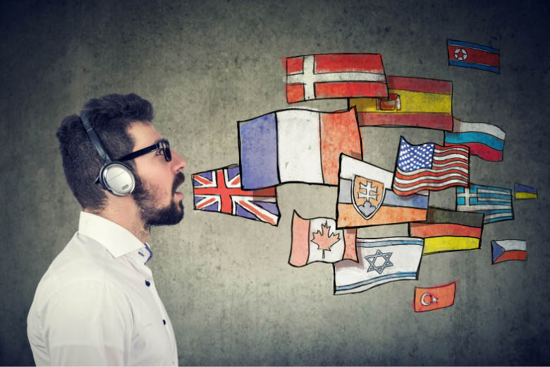a man with headphones over his ears and his mouth open face flags which represent speaking different languages from different countries