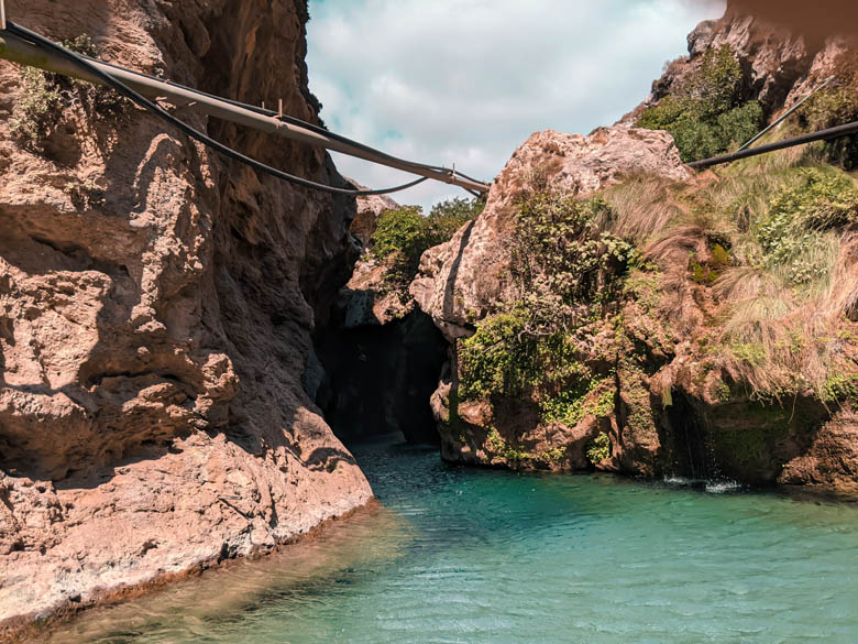 entrance to water cave at kourtaliotiko canyon