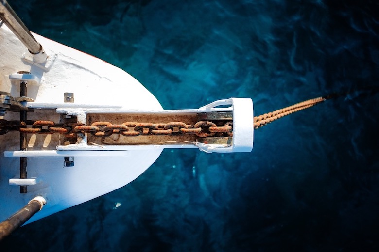 aerial view bow of scuba liveaboard anchored at sea