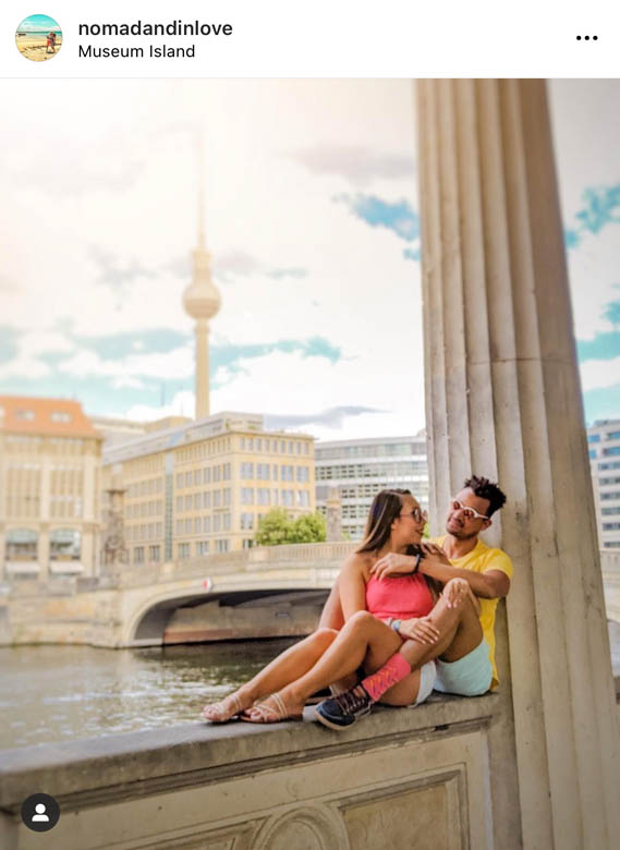 an instagrammable spot in berlin is on museum island along the stone columns with a view of the berlin tv tower in the background