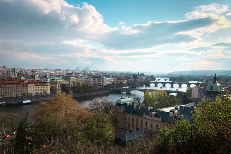 a great photography spot in prague from letna park overlooking the city and the city's many bridges as seen on a free prague walking tour