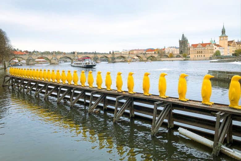 the yellow penguins art installation is one of the must see places to visit in prague