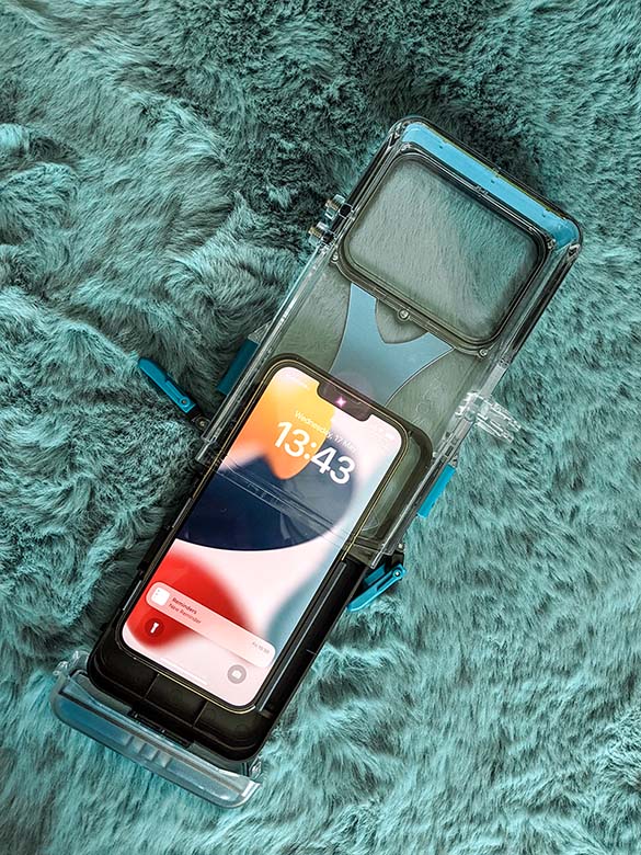 iphone water case with slide in compartment and clasps to release