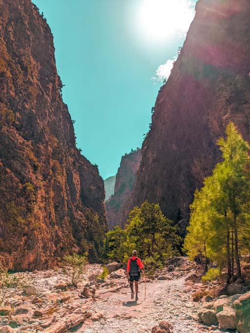 a solo traveler hiking samaria gorge by himself