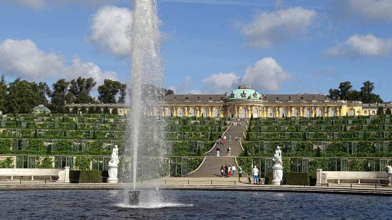 sanssouci palace and its surrounding gardens in the UNESCO world heritage site of sanssouci park is a must see on a day trip from berlin germany