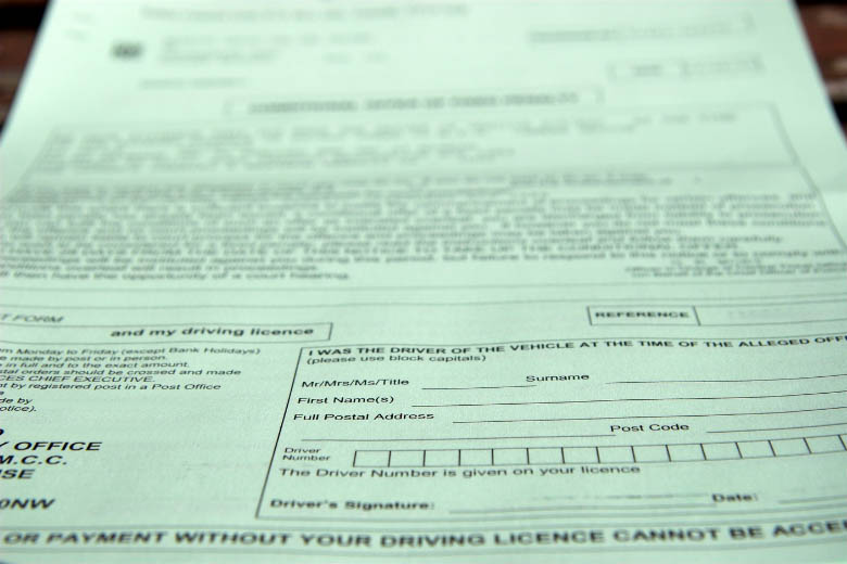 a close up of a speeding ticket issued in Europe