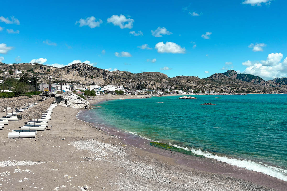 a half sandy half pebble beach in rhodes island greece