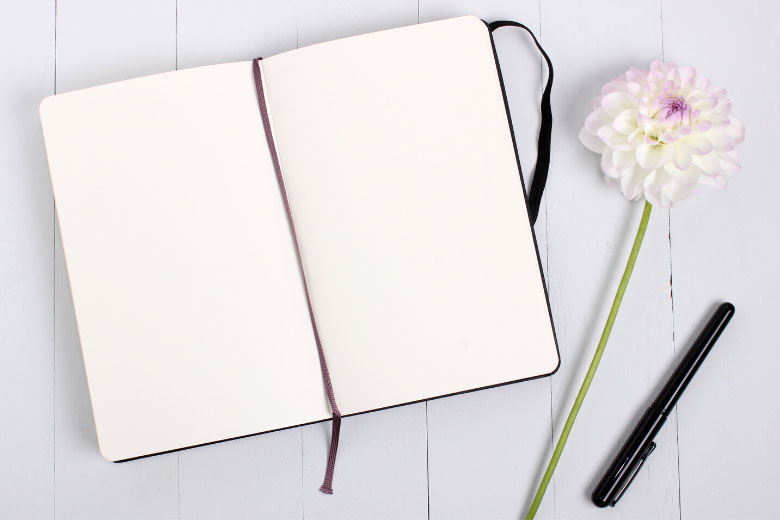 a notebook to create a to-do list for daily and weekly tasks