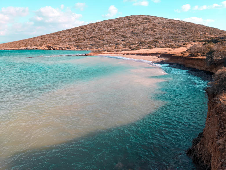 a half pebble half sandy beach off the beaten track beach in east crete called vayu beach in greece