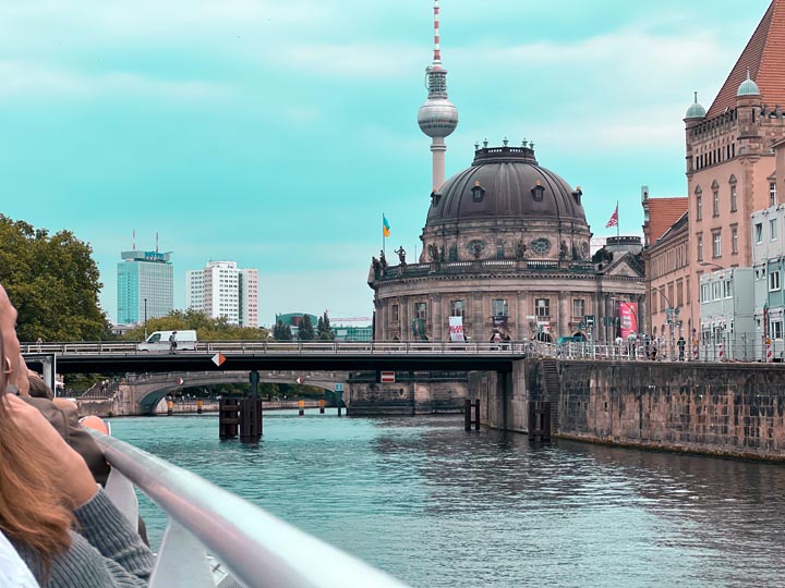 a view of museum island in berlin from a river cruise
